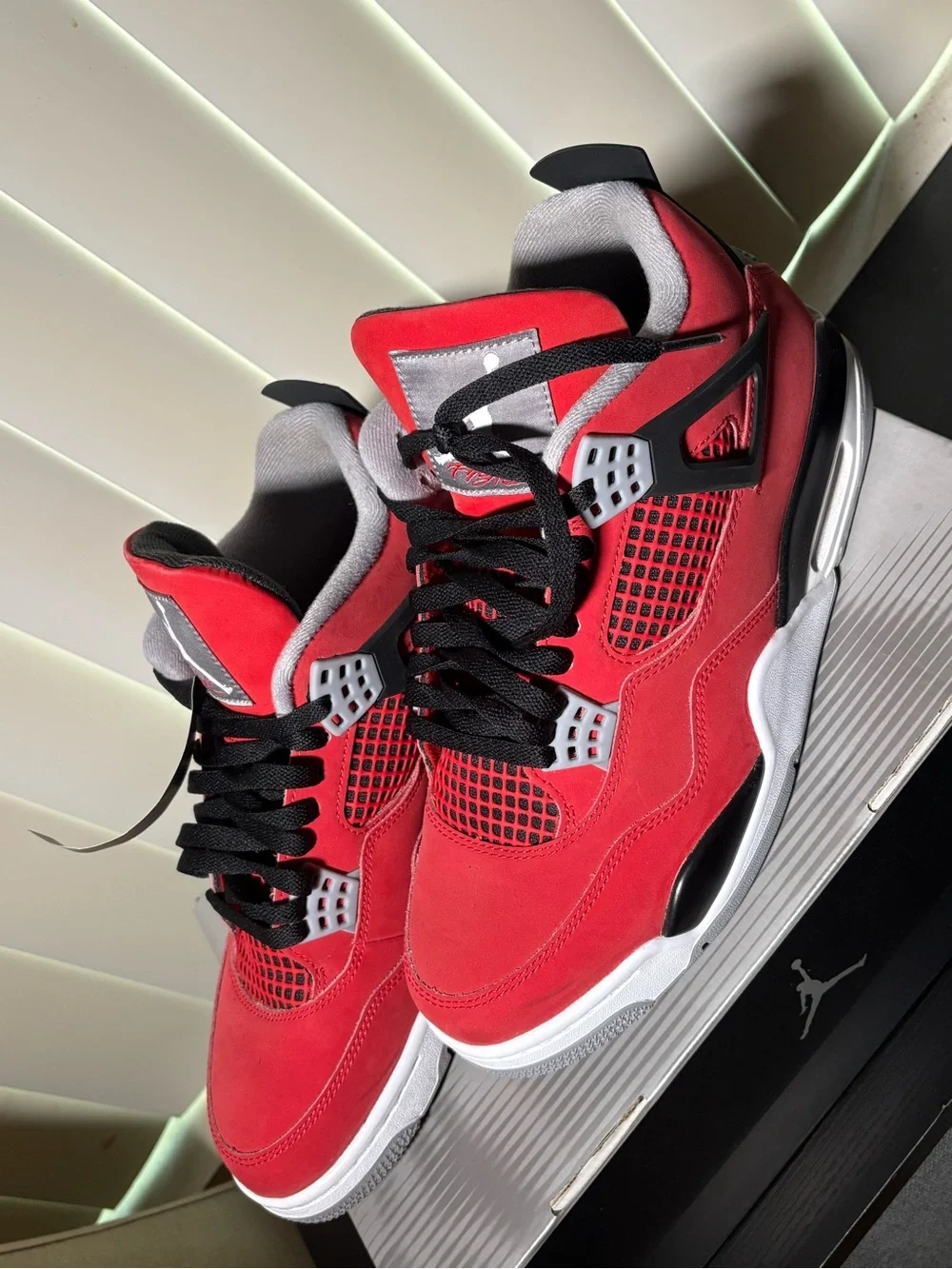 Jordan 4 Retro toro brave